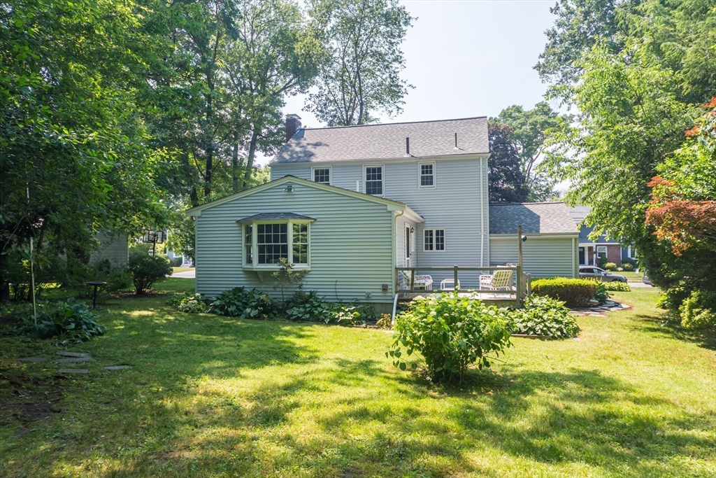 16 Surrey Lane Natick, MA 01760 - Photo 23 of 28 a view of a house with a yard