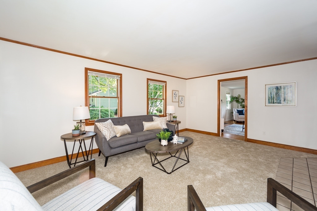 16 Surrey Lane Natick, MA 01760 - Photo 4 of 28 a living room with furniture and a window