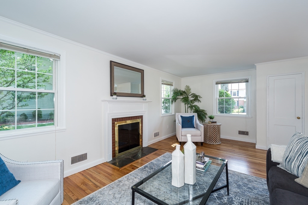 16 Surrey Lane Natick, MA 01760 - Photo 8 of 28 a living room with furniture fireplace and window