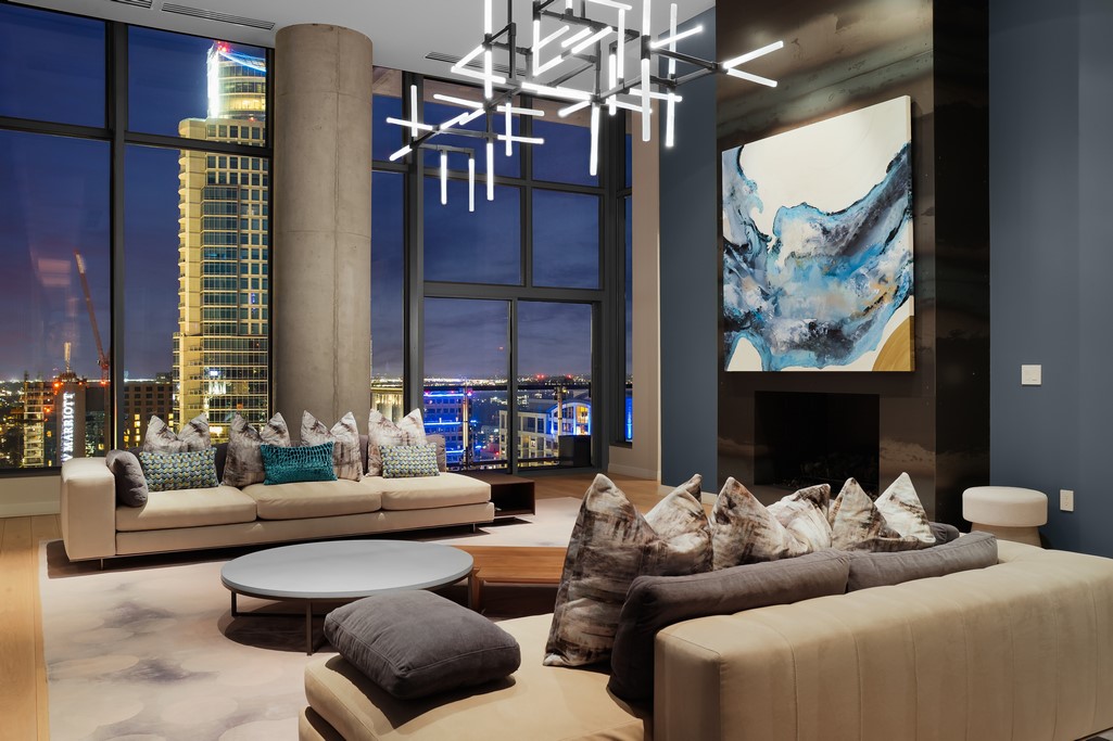 210 Lavaca Street, Unit 3604 Austin, TX 78701 - Photo 1 of 1 a living room with furniture and a chandelier