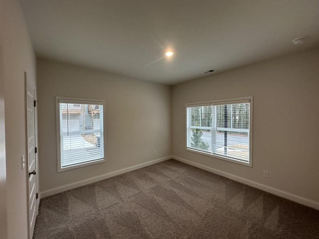 814 Glennferry Bend Southwest Mableton, GA 30126 - Photo 11 of 33 an empty room with windows
