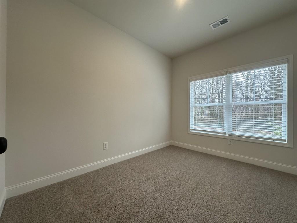 814 Glennferry Bend Southwest Mableton, GA 30126 - Photo 16 of 33 an empty room with a window