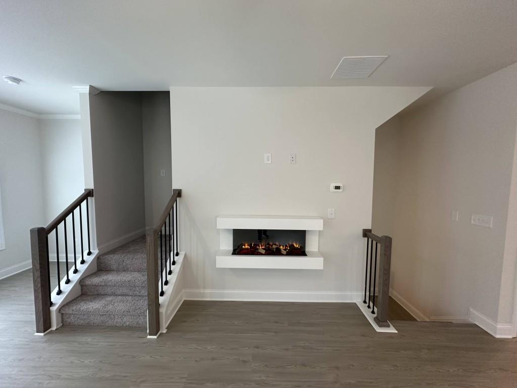 814 Glennferry Bend Southwest Mableton, GA 30126 - Photo 8 of 33 a living room with furniture and a fireplace