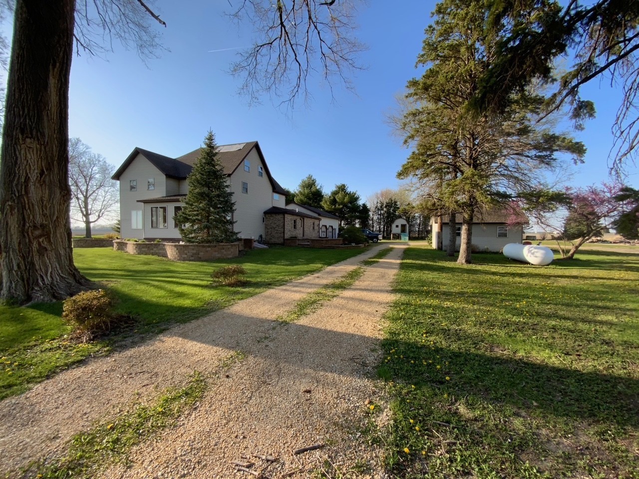 382 Keigwin Road Walnut, IL 61376 - Photo 4 of 49 a view of a house with a big yard