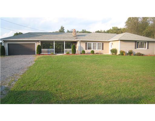 Exterior Front. Welcome to 152 Winterset, 1.3 flat, level acres, located within 10 minutes of Cranberry Twp, I-79 and PA turnpike. Lots of updates since 2007 - siding, doors, almost all windows, flooring, lighting, furnace, electric panel w/220 service and more..