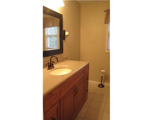152 Winterset Road Economy, PA 15005 - Photo 13 of 18 Full Bath. Updated bath has bronze lighting and fixtures, tile surround on shower and ceramic floors.