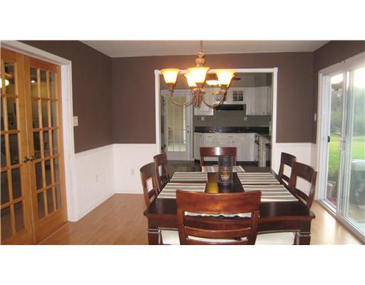 152 Winterset Road Economy, PA 15005 - Photo 5 of 18 Dining Room. This view of the dining room looks back toward the kitchen. Note the french doors that separate the living and dining rooms.