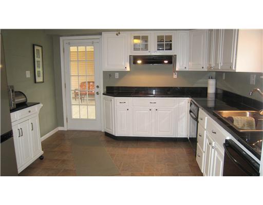 152 Winterset Road Economy, PA 15005 - Photo 6 of 18 Kitchen. Great kitchen w/granite tiled countertops, electric cooktop, built in oven, dishwasher and vinyl flooring.