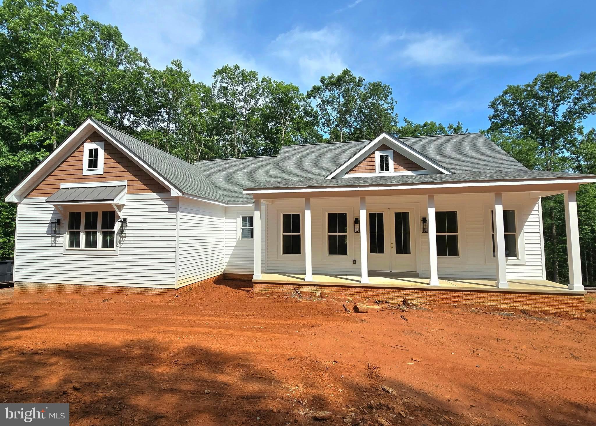 4120 Cabin Road Reva, VA 22735 - Photo 2 of 11 a front view of a house with a garden