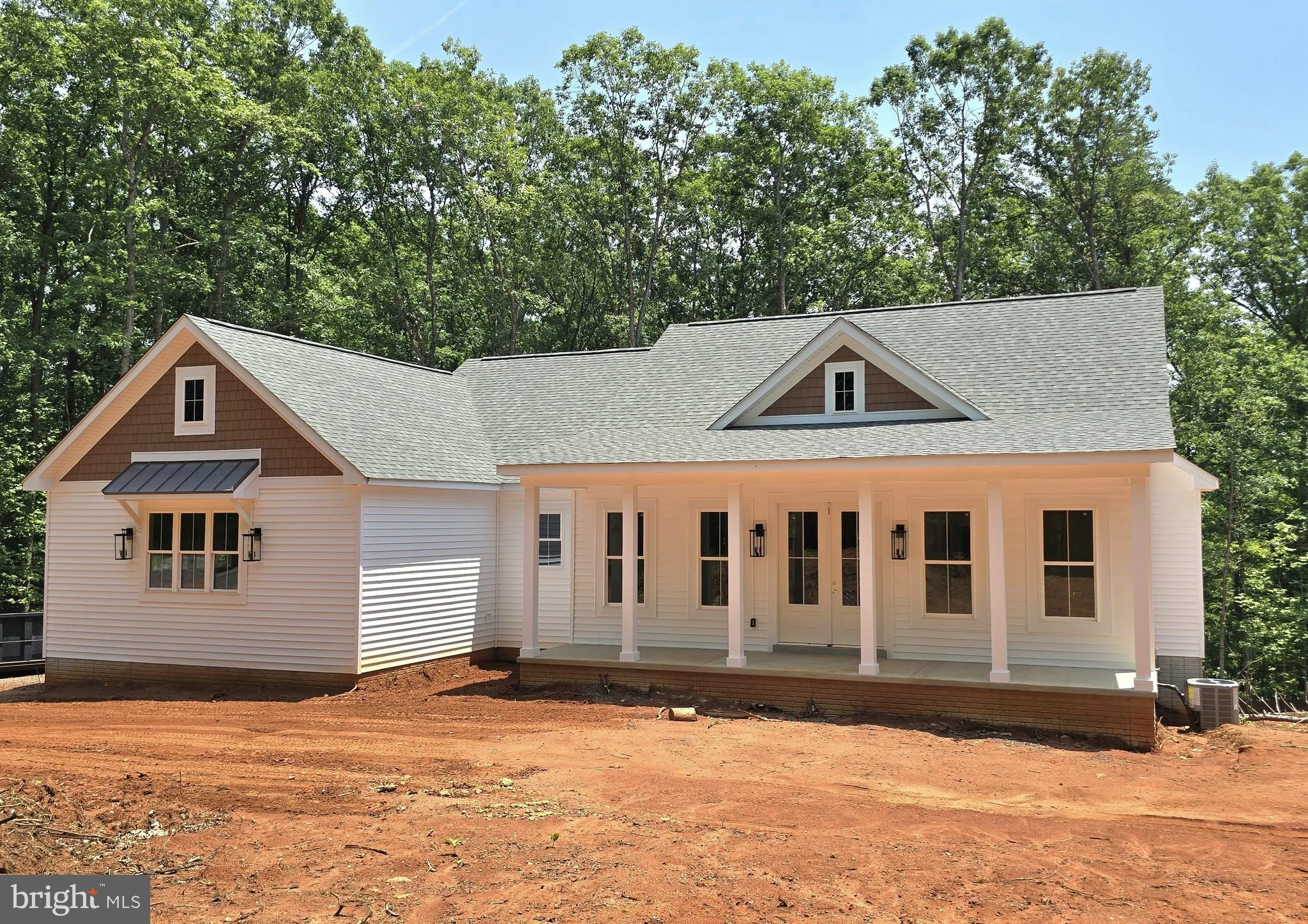 4120 Cabin Road Reva, VA 22735 - Photo 3 of 11 a front view of a house with a yard