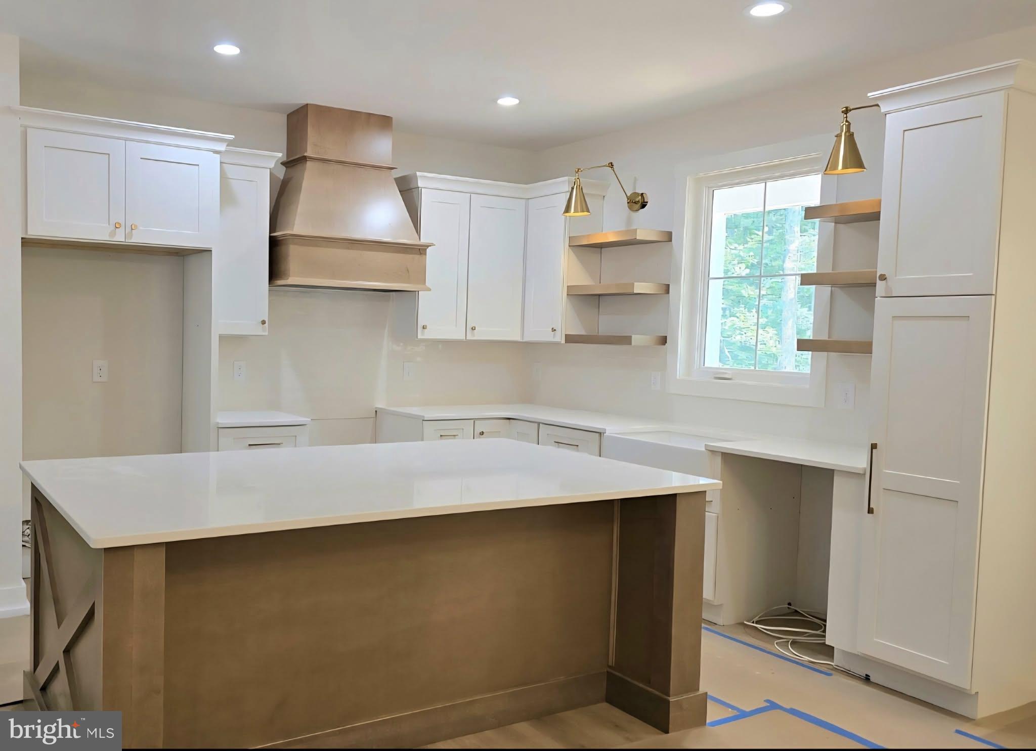 4120 Cabin Road Reva, VA 22735 - Photo 5 of 11 a kitchen with stainless steel appliances a sink stove and refrigerator