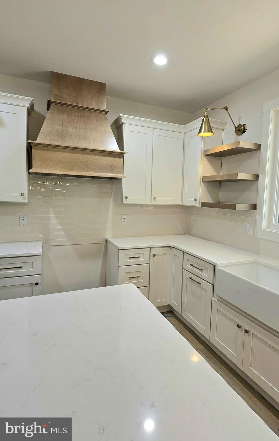 4120 Cabin Road Reva, VA 22735 - Photo 6 of 11 a kitchen with a cabinets and chandelier
