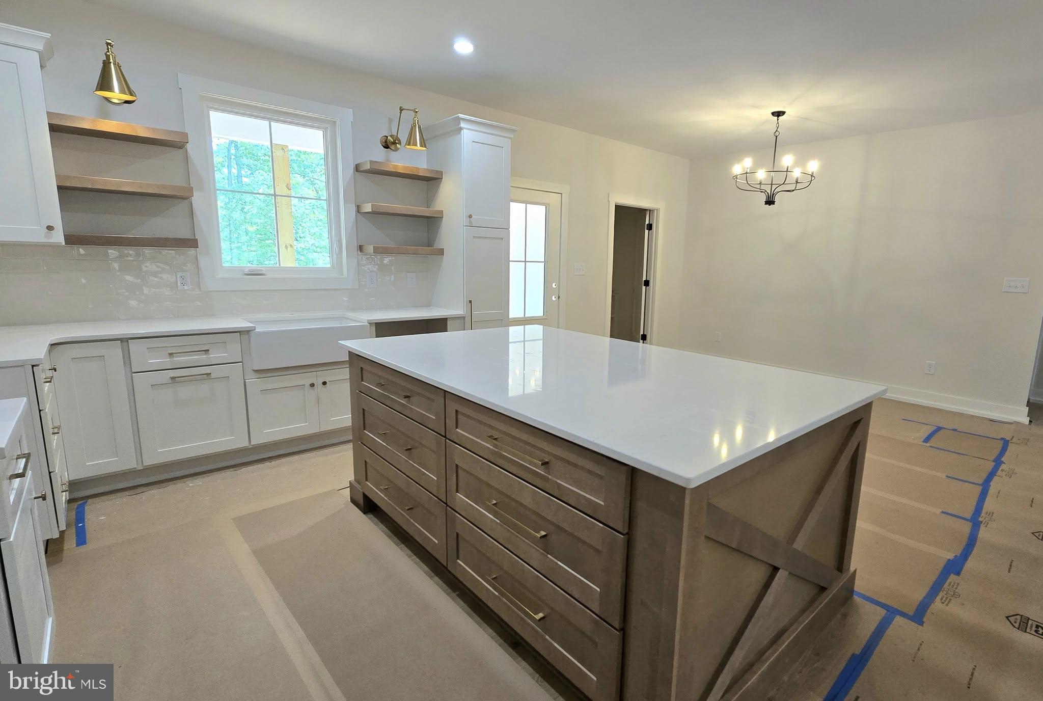 4120 Cabin Road Reva, VA 22735 - Photo 8 of 11 a kitchen with a stove a sink and dishwasher