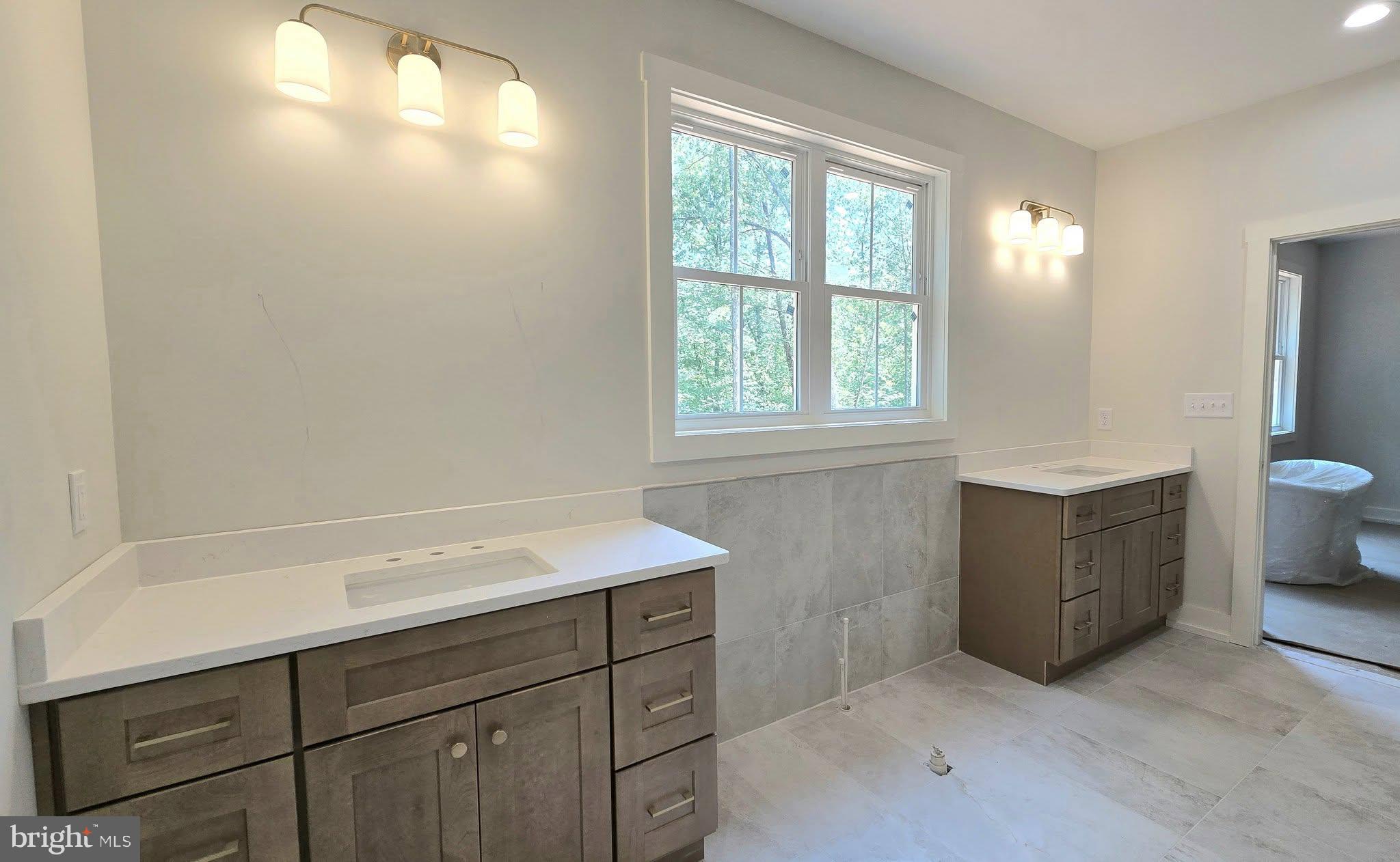 4120 Cabin Road Reva, VA 22735 - Photo 10 of 11 a bathroom with a sink and a vanity