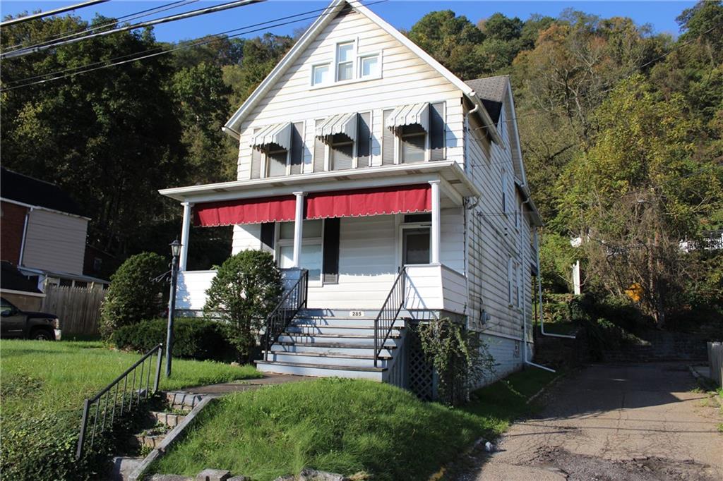 283 Freeport Road Creighton, PA 15030 - Photo 2 of 25 a front view of a house with garden
