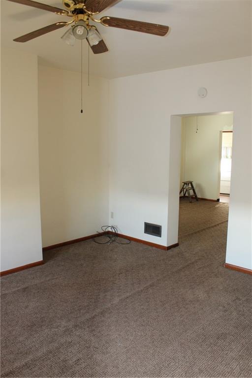 283 Freeport Road Creighton, PA 15030 - Photo 17 of 25 an empty room with a empty space and fan