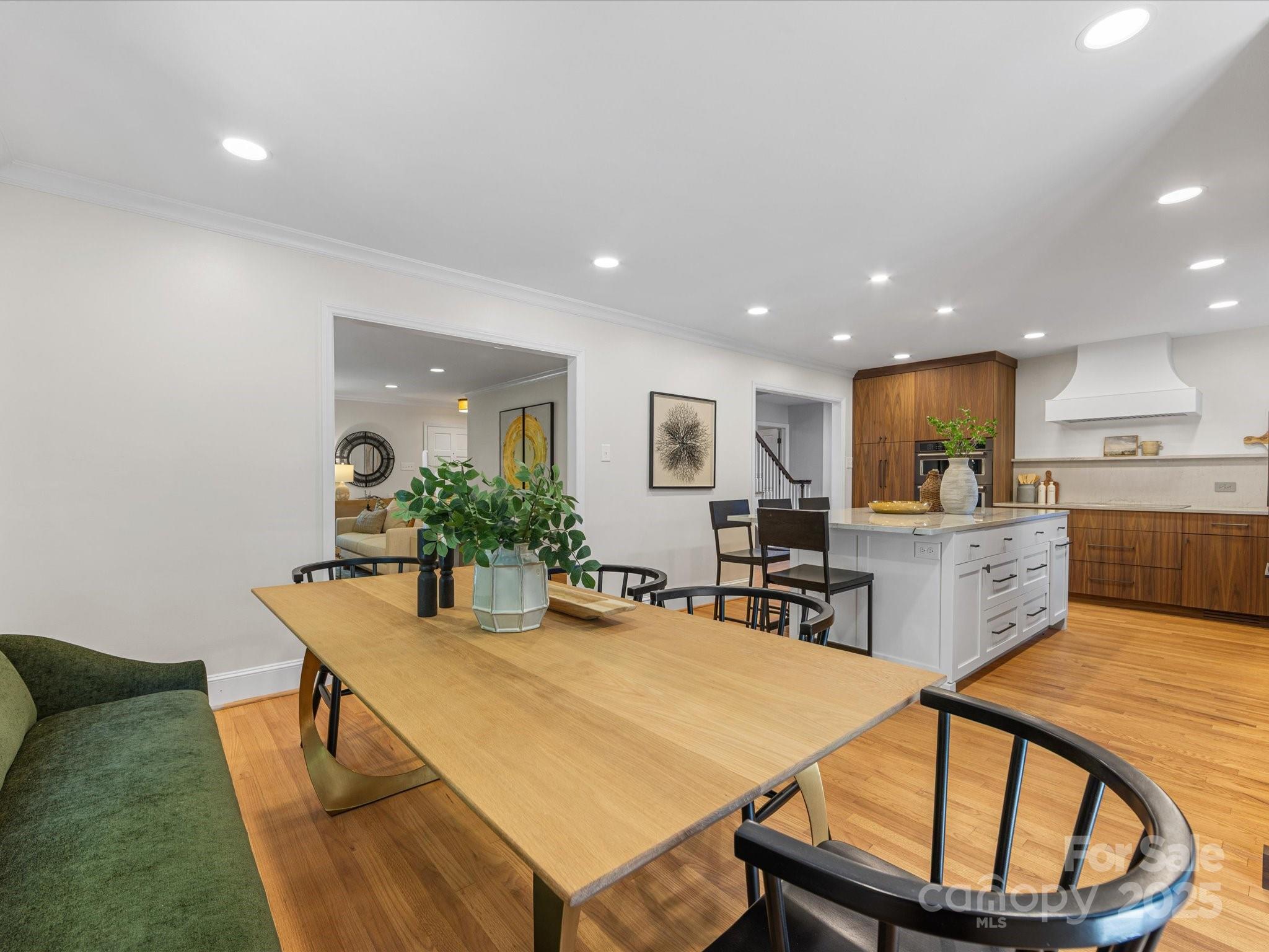2118 Sharon Road Charlotte, NC 28207 - Photo 13 of 48 a kitchen with a table and chairs in it
