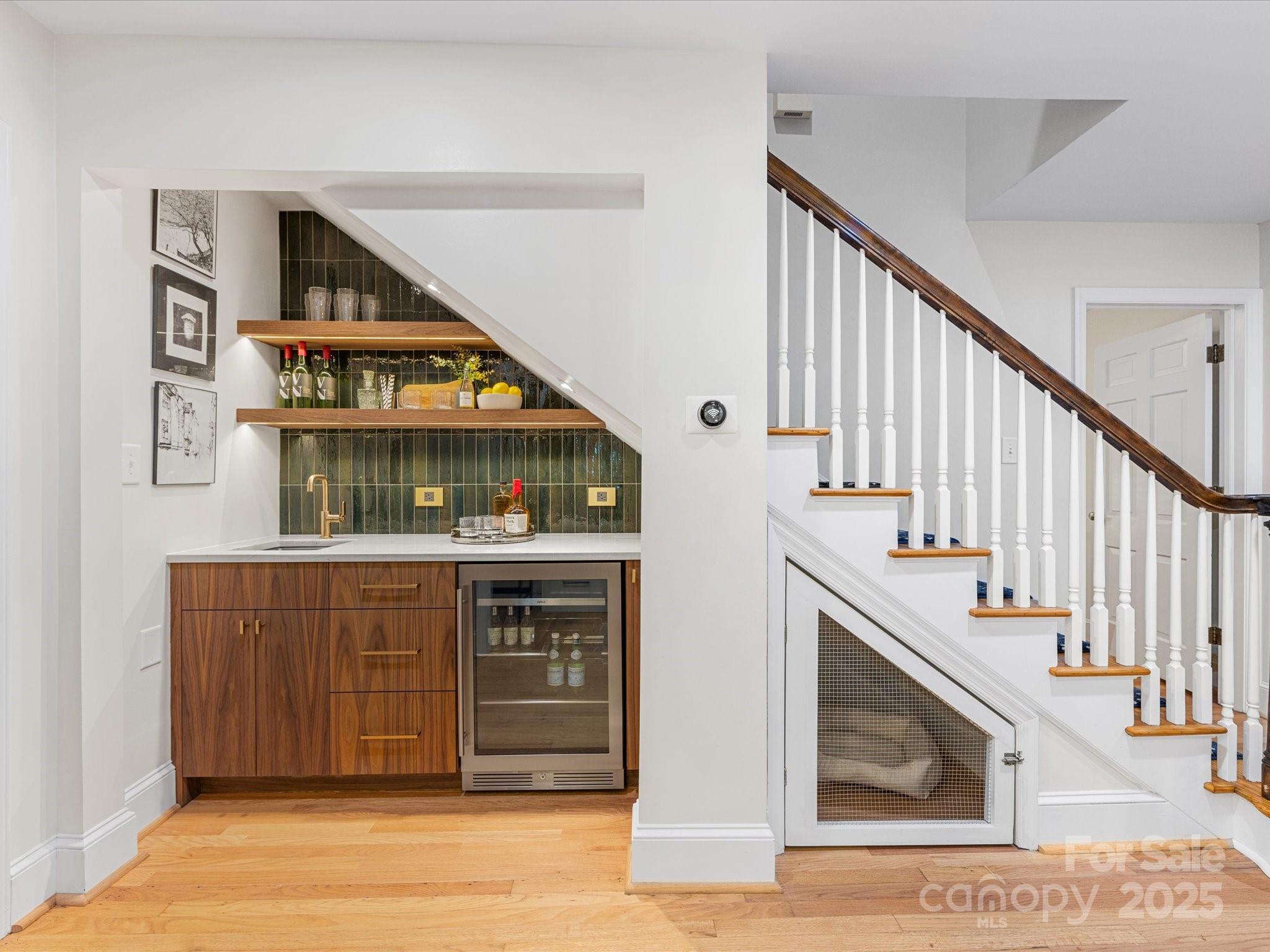 2118 Sharon Road Charlotte, NC 28207 - Photo 18 of 48 a view of entryway and hall with wooden floor