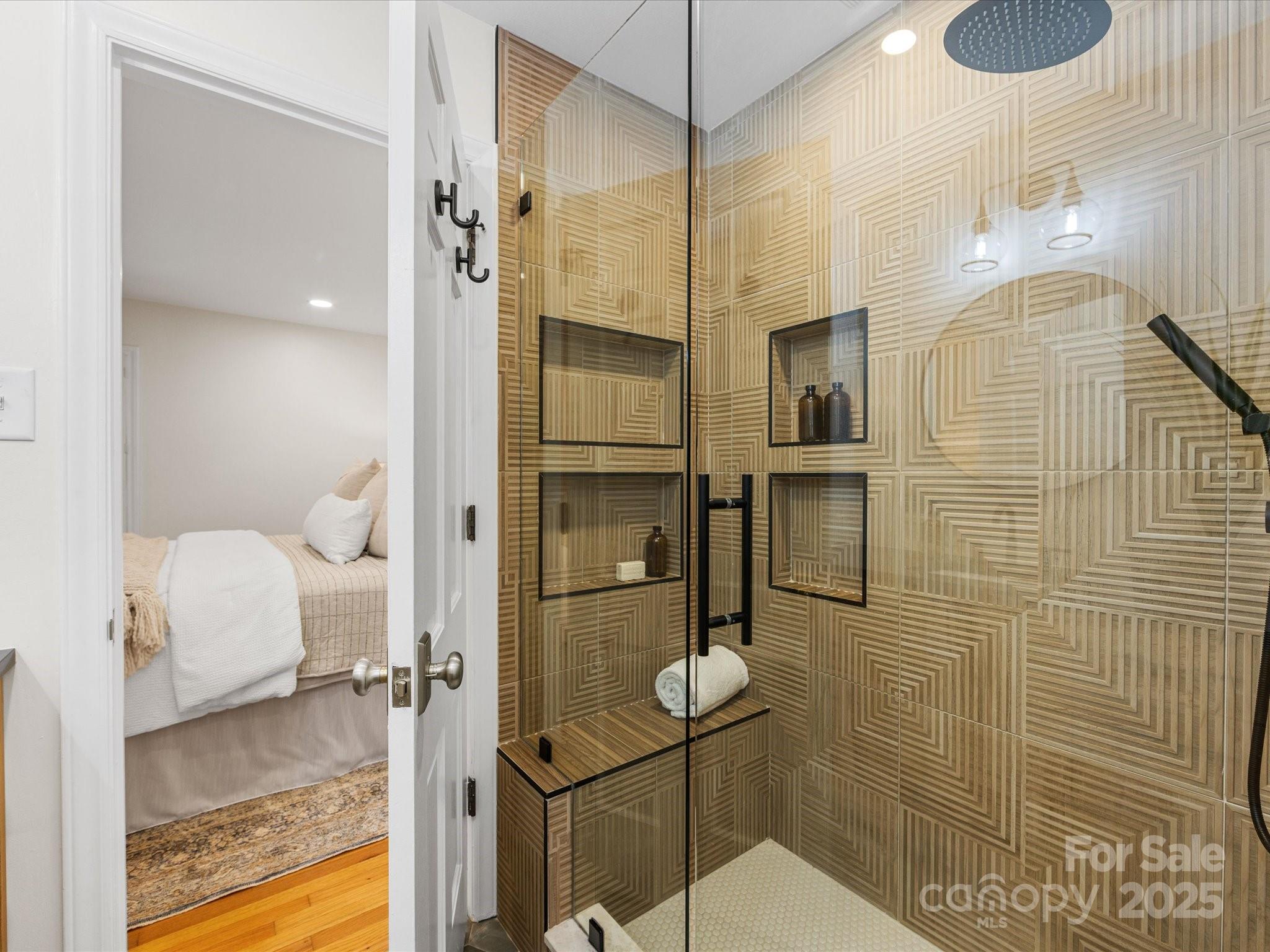 2118 Sharon Road Charlotte, NC 28207 - Photo 24 of 48 a bathroom with a sink and a mirror