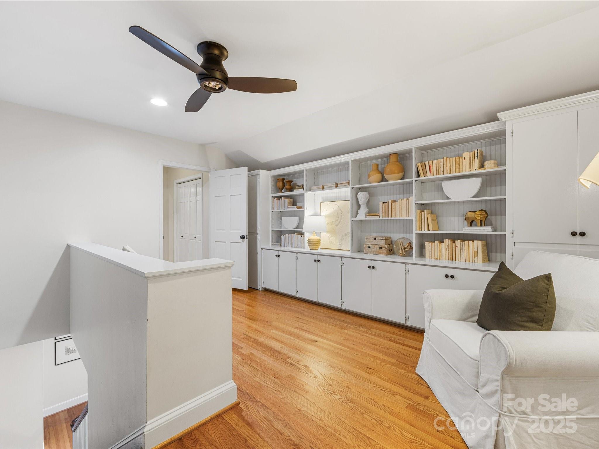 2118 Sharon Road Charlotte, NC 28207 - Photo 32 of 48 a living room with stainless steel appliances furniture and a rug