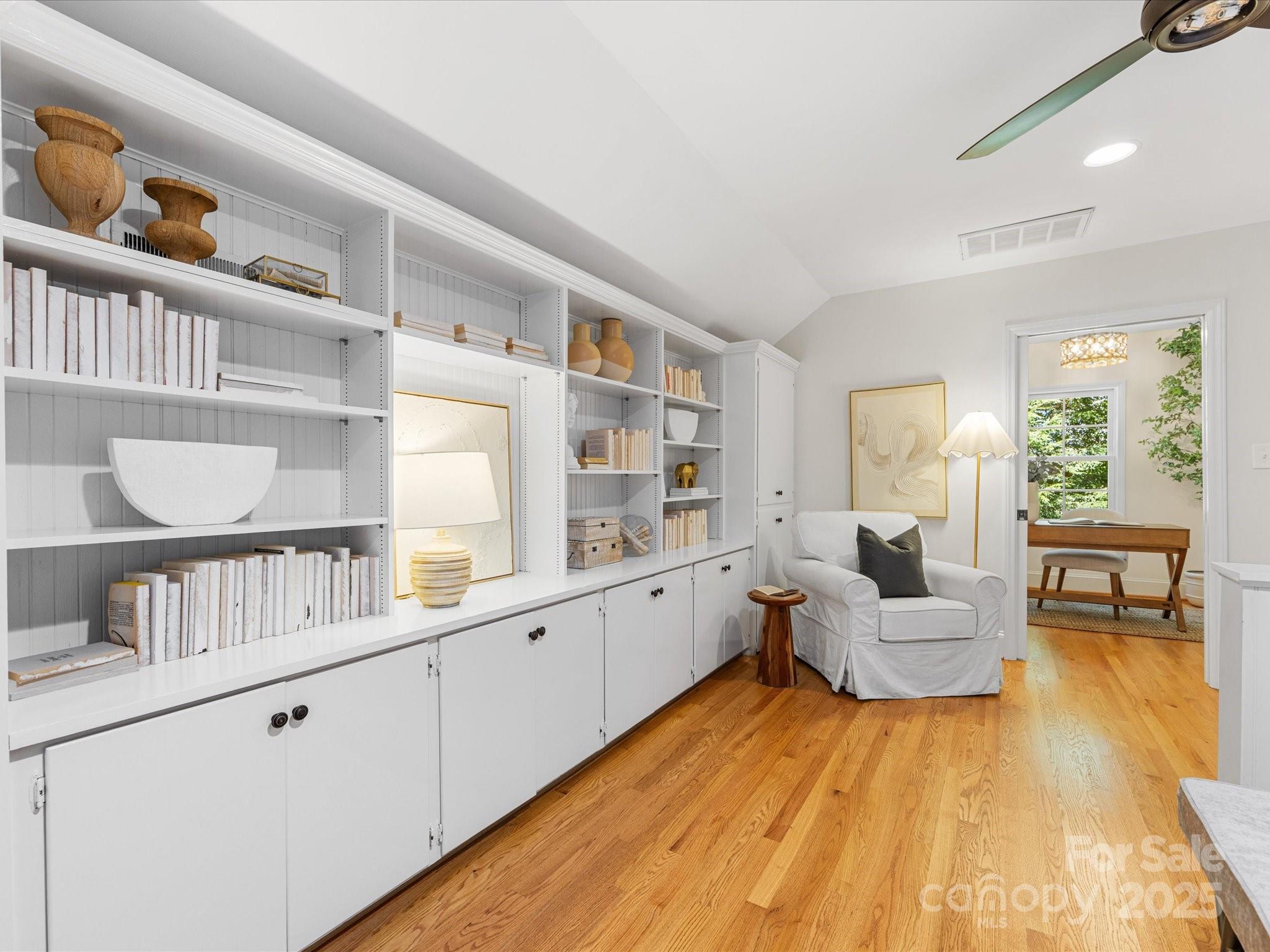 2118 Sharon Road Charlotte, NC 28207 - Photo 33 of 48 a living room with furniture and a wooden floor