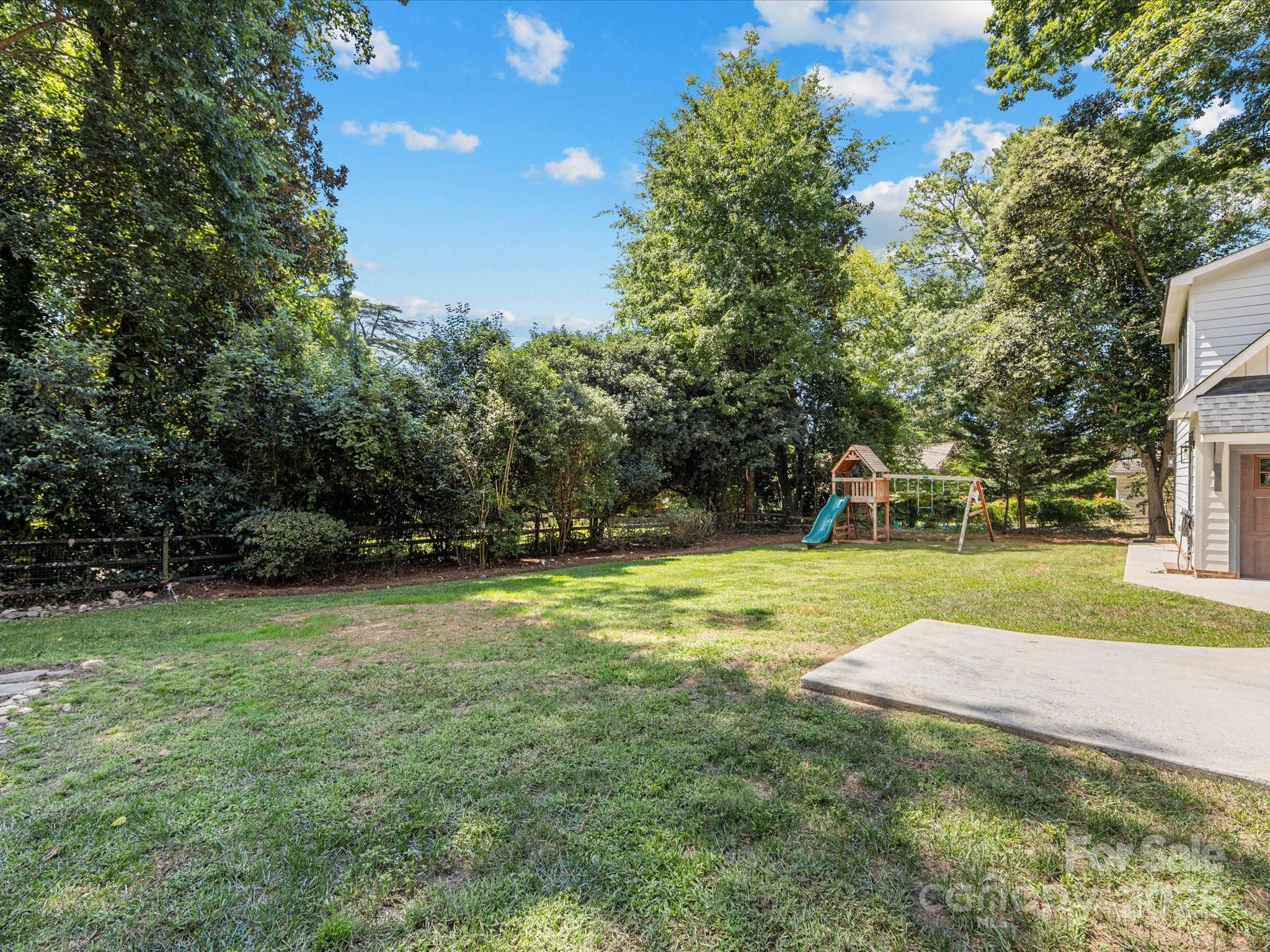 2118 Sharon Road Charlotte, NC 28207 - Photo 40 of 48 a view of a tree in a yard