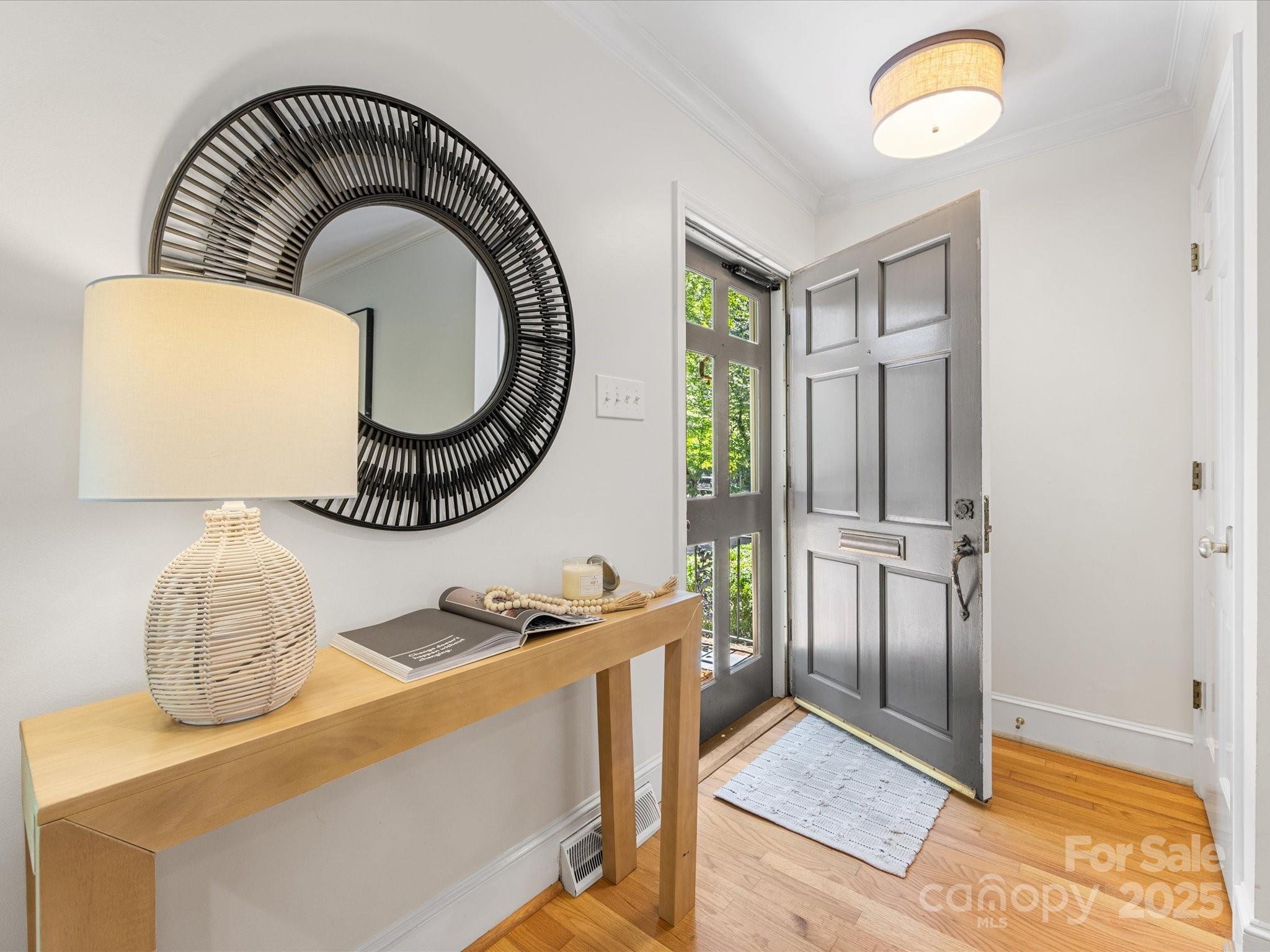 2118 Sharon Road Charlotte, NC 28207 - Photo 4 of 48 a bathroom with a sink mirror and vanity