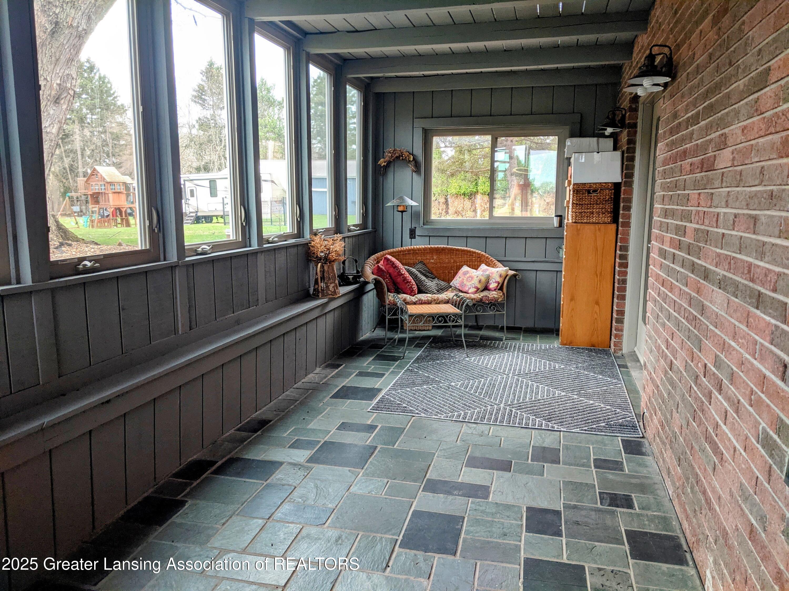 2600 East Round Lake Road Dewitt, MI 48820 - Photo 33 of 37 Sunroom