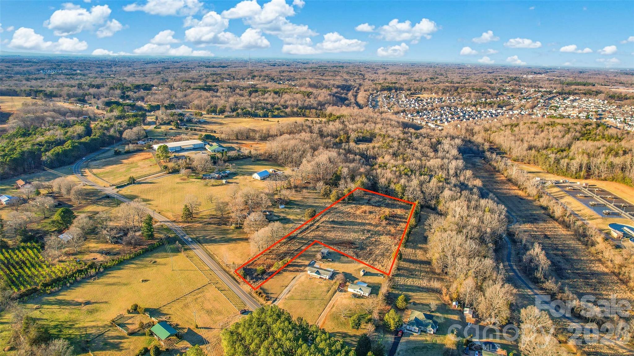297 Johnson Dairy Road Mooresville, NC 28115 - Photo 3 of 13 an aerial view of residential houses with outdoor space