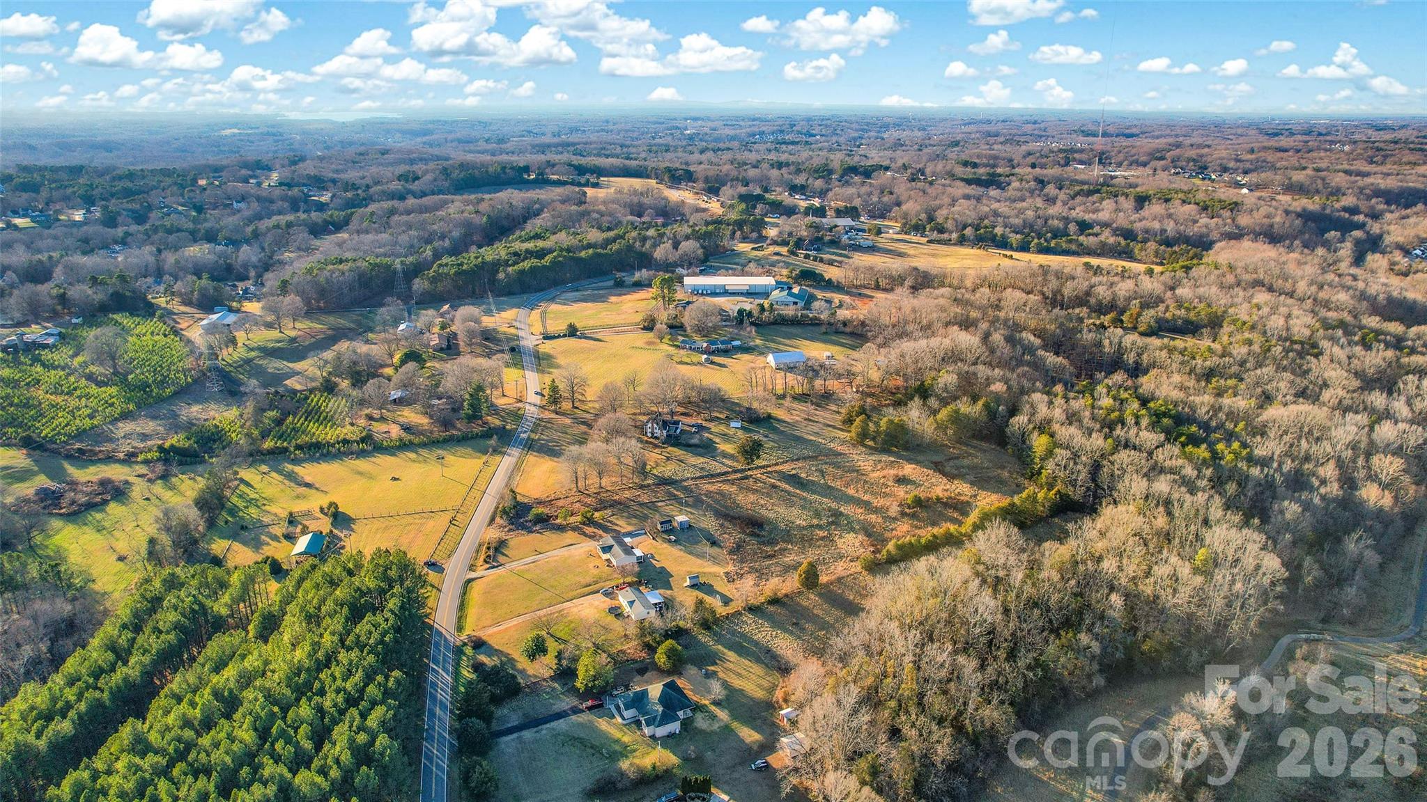 297 Johnson Dairy Road Mooresville, NC 28115 - Photo 7 of 13 an aerial view of residential houses with outdoor space