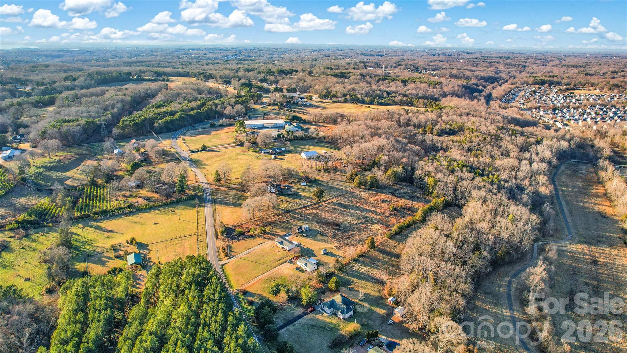 297 Johnson Dairy Road Mooresville, NC 28115 - Photo 8 of 13 an aerial view of residential houses with outdoor space