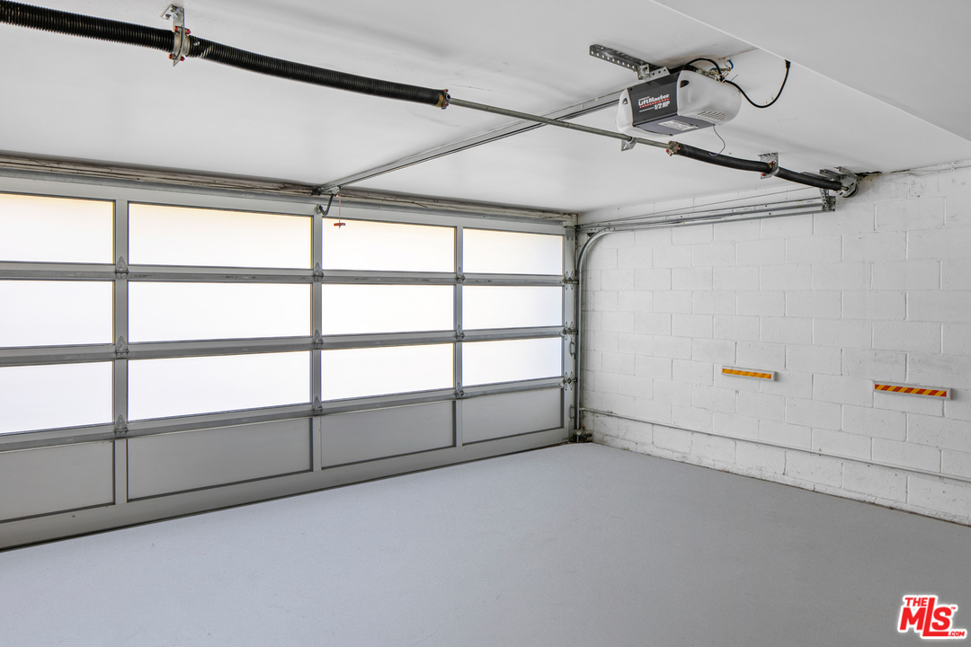 1857 North Beverly Drive Beverly Hills, CA 90210 - Photo 47 of 49 a view of a garage