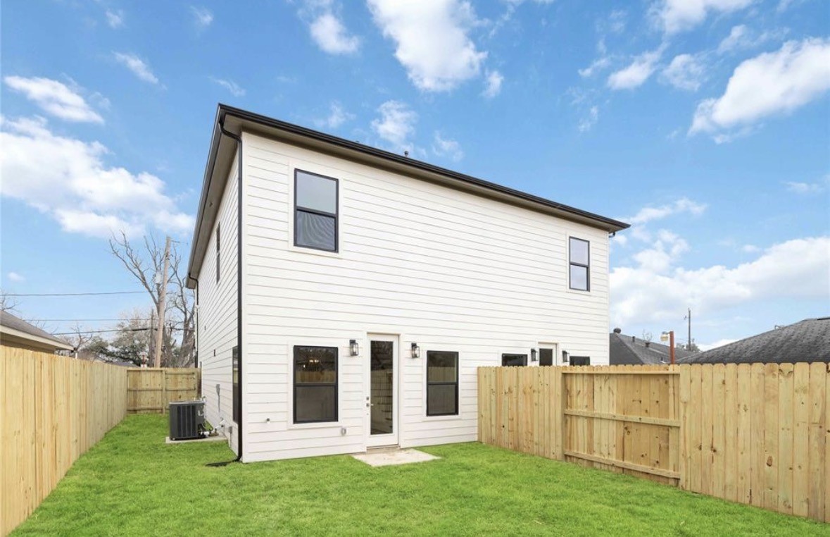 7980 Angus Street, Unit A Houston, TX 77028 - Photo 14 of 15 a view of house with backyard