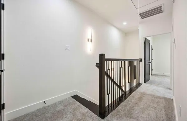 a view of a hallway with a hallway