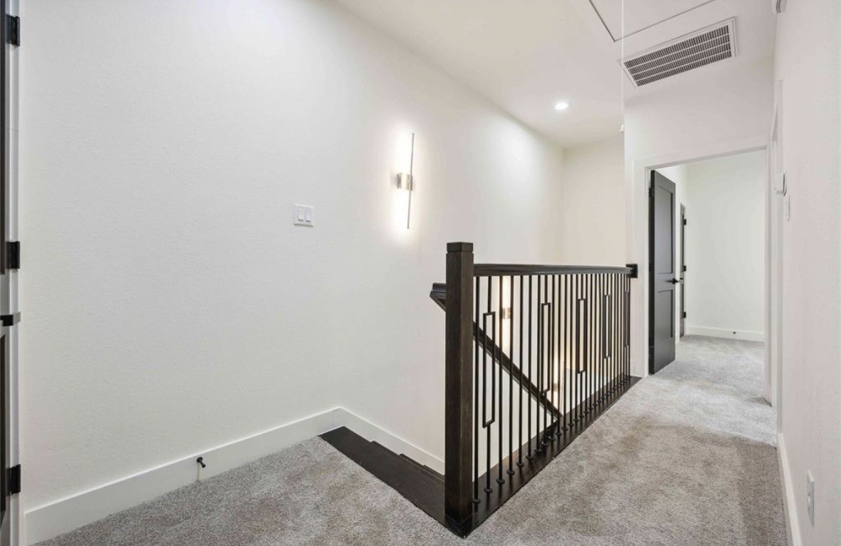 7980 Angus Street, Unit A Houston, TX 77028 - Photo 5 of 15 a view of a hallway with a hallway