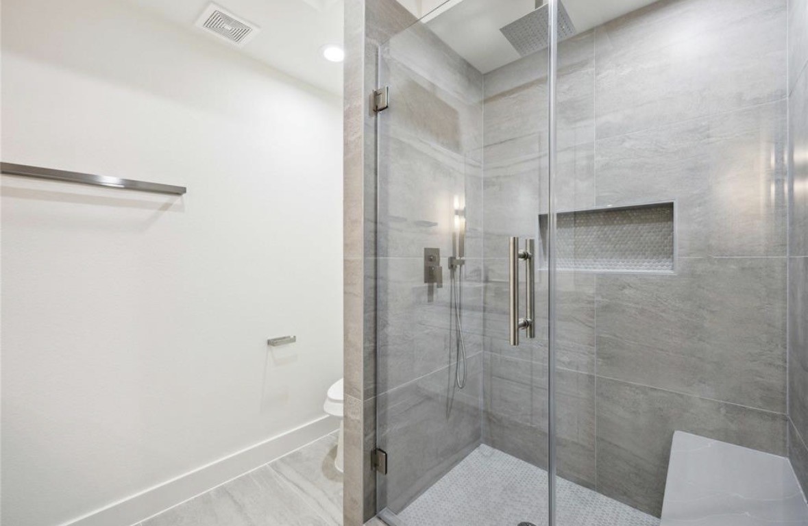 7980 Angus Street, Unit A Houston, TX 77028 - Photo 7 of 15 a bathroom with a shower