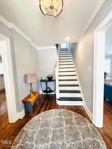 a room with furniture and a rug