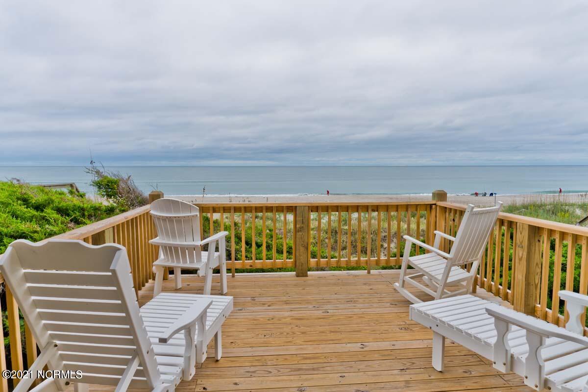 4105 Ocean Drive, Unit E & W Emerald Isle, NC 28594 - Photo 5 of 72 Photo of main level deck - West Side- New upper decks in 2020 for both sides and new, lower decks in 2021.