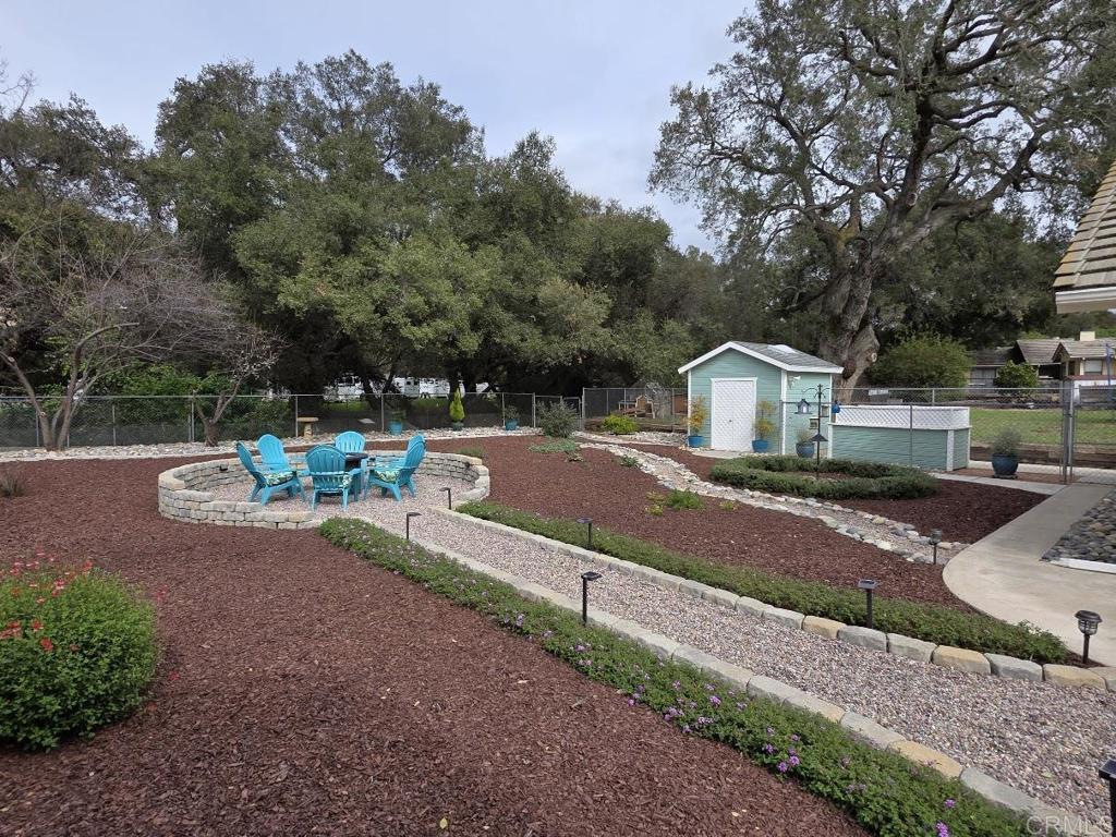 25084 Pappas Road Ramona, CA 92065 - Photo 33 of 58 a front view of a house with a yard and street view