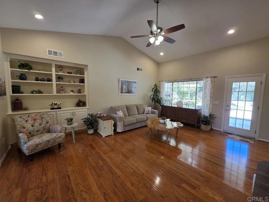 25084 Pappas Road Ramona, CA 92065 - Photo 6 of 58 a living room with furniture and wooden floor
