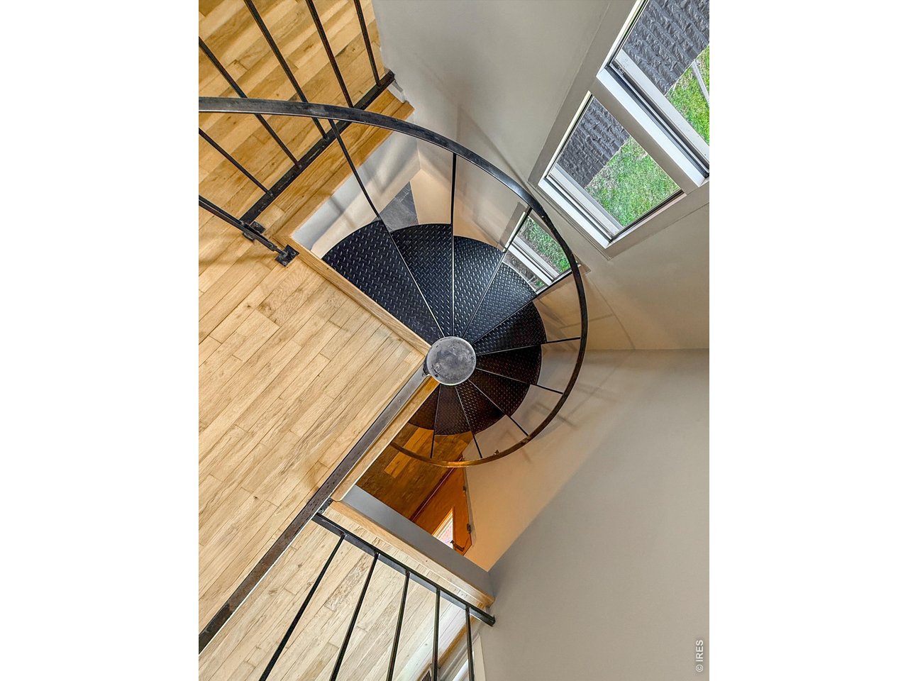 6709 Olde Stage Road Boulder, CO 80302 - Photo 22 of 44 Spiral Staircase to Upper Level