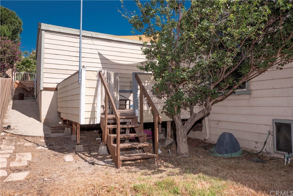 3240 Gibraltar Dr. Riverside, CA 92506 - Photo 46 of 50 stairs off mid/entry level deck provide backyard access