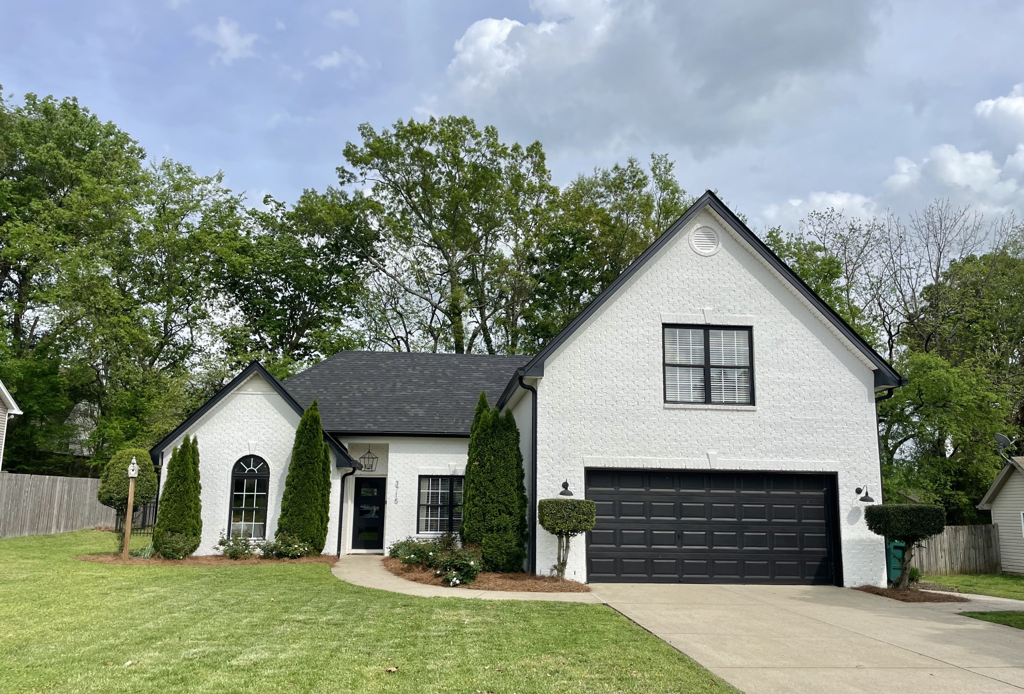 3715 Ivanora Drive Spring Hill, TN 37174 - Photo 3 of 74 a front view of a house with a yard