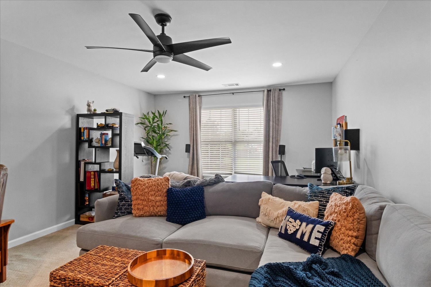 3715 Ivanora Drive Spring Hill, TN 37174 - Photo 38 of 74 a living room with furniture a rug and a large window