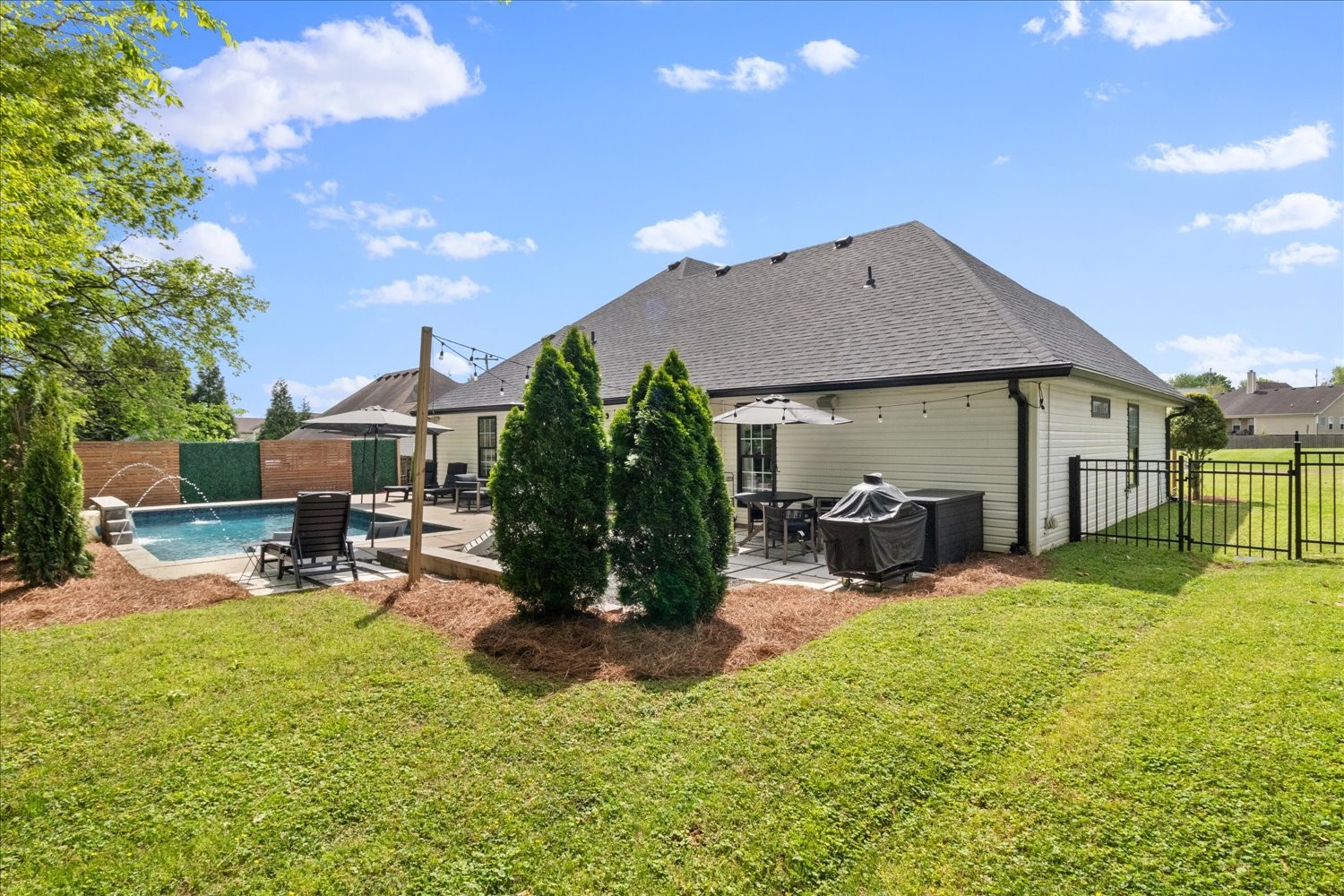 3715 Ivanora Drive Spring Hill, TN 37174 - Photo 42 of 74 a view of a house with backyard porch and sitting area