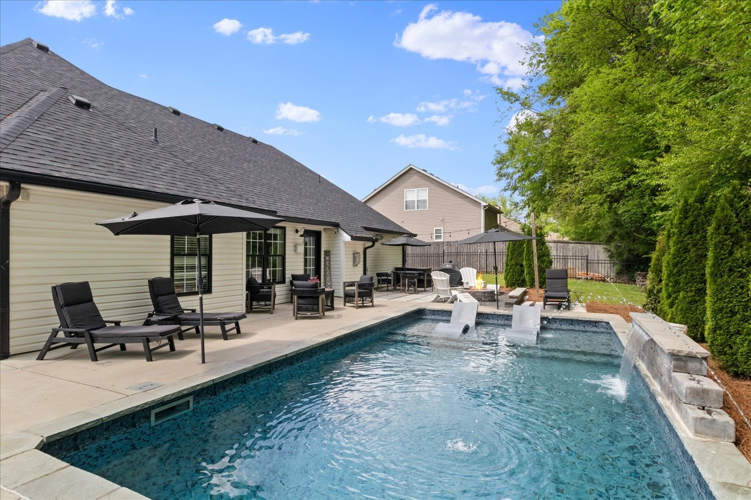 3715 Ivanora Drive Spring Hill, TN 37174 - Photo 44 of 74 a view of a house with backyard porch and sitting area
