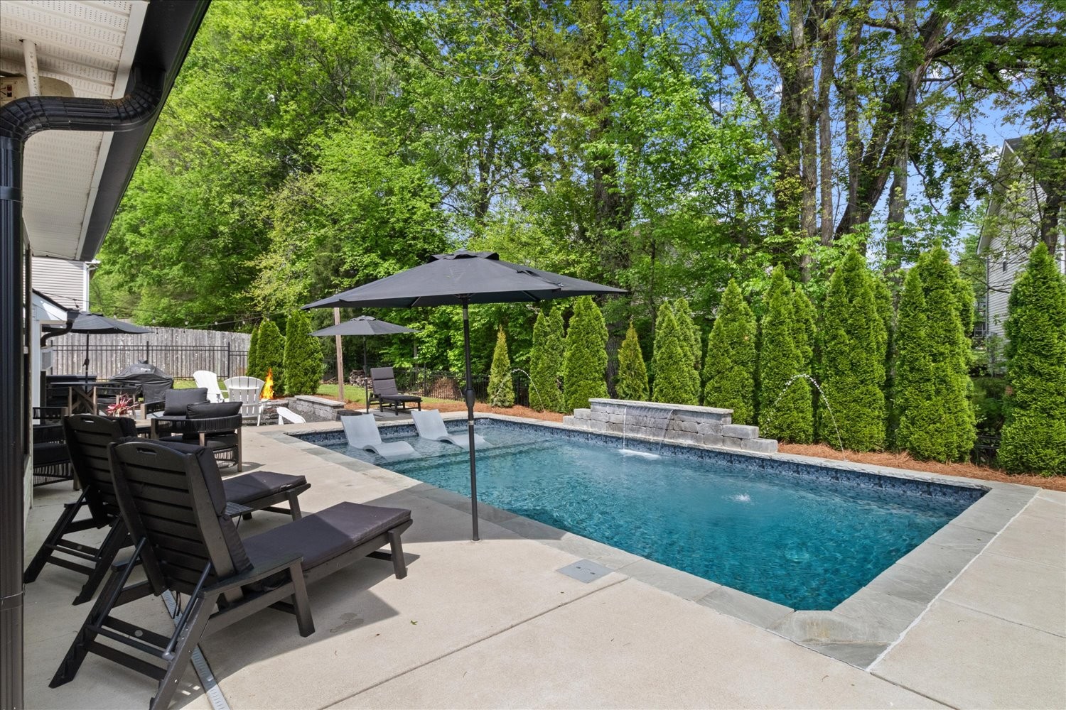 3715 Ivanora Drive Spring Hill, TN 37174 - Photo 45 of 74 a view of a backyard with sitting area
