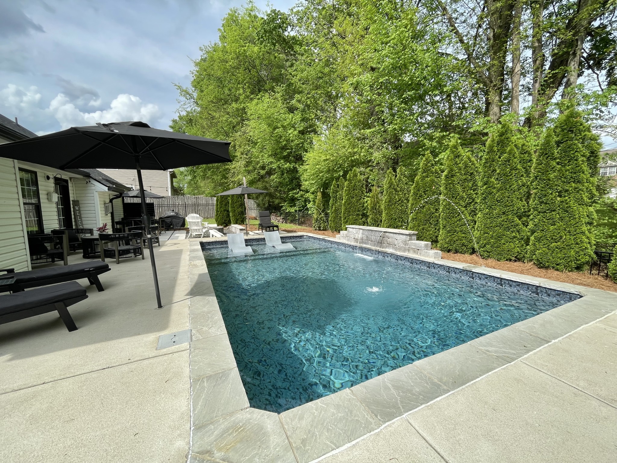 3715 Ivanora Drive Spring Hill, TN 37174 - Photo 49 of 74 a view of a backyard with sitting area