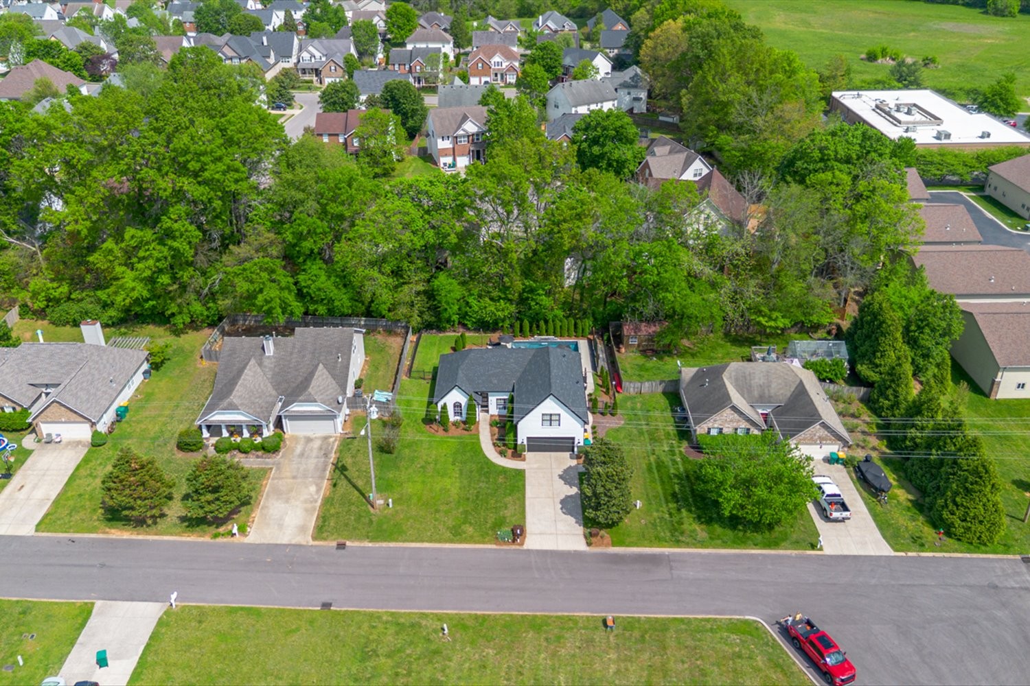 3715 Ivanora Drive Spring Hill, TN 37174 - Photo 56 of 74 an aerial view of house with yard swimming pool and outdoor seating
