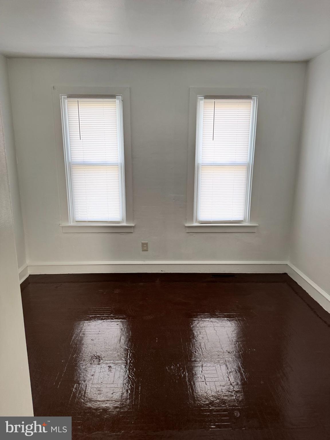 1060 Pike Street Reading, PA 19604 - Photo 9 of 11 a view of a small space with wooden floor and a window